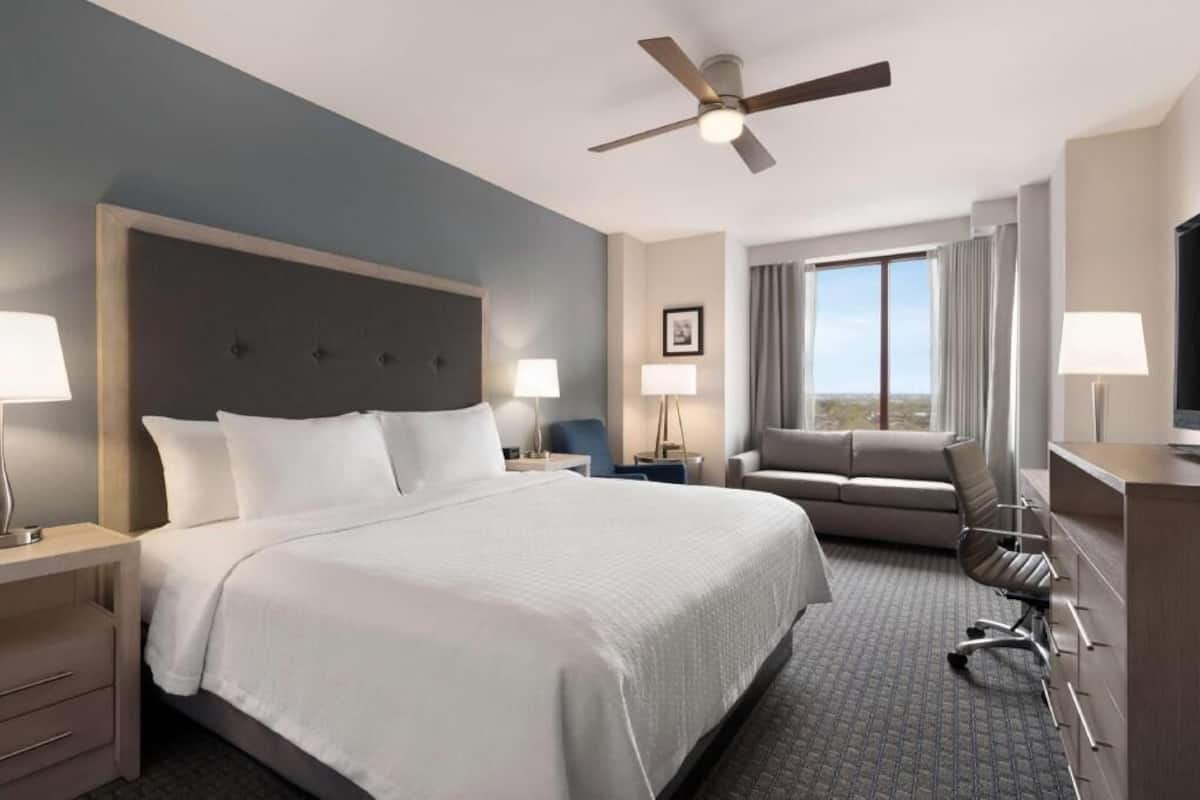 Premium bedding, blackout curtains, iron/ironing board