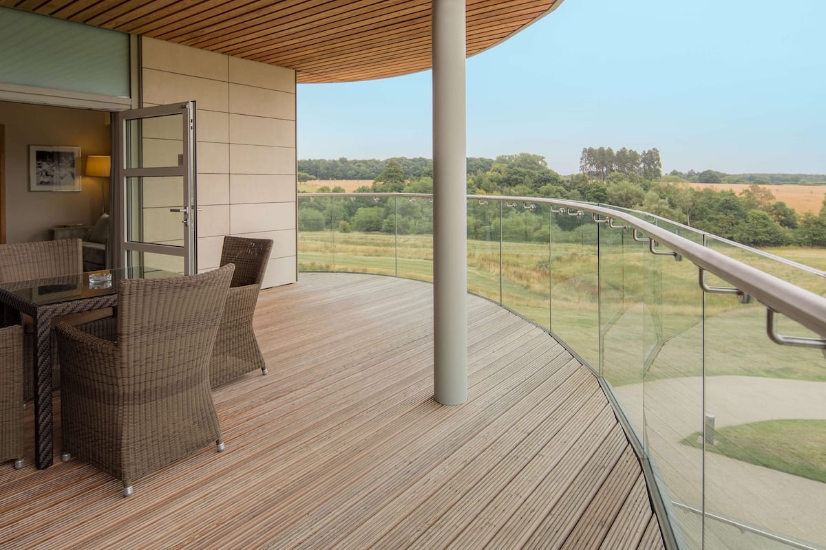 One bedroom suite with balcony | Living area | 50-inch flat-screen TV with digital channels, TV