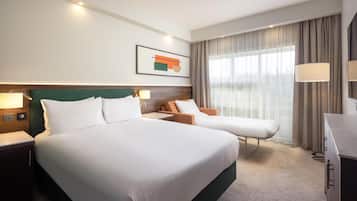 Family Room | Premium bedding, in-room safe, desk, iron/ironing board