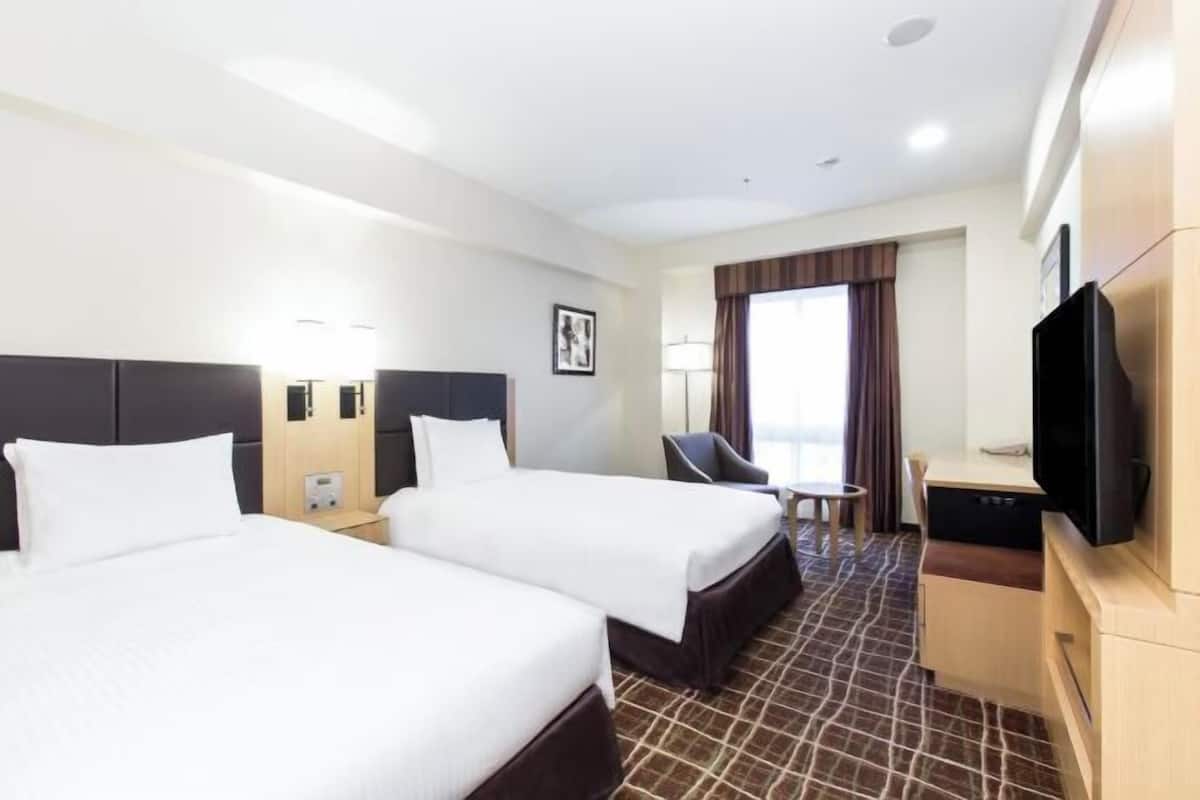 In-room safe, desk, blackout curtains, iron/ironing board