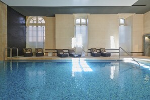 Indoor pool, open 8:00 AM to 8:00 PM, pool loungers