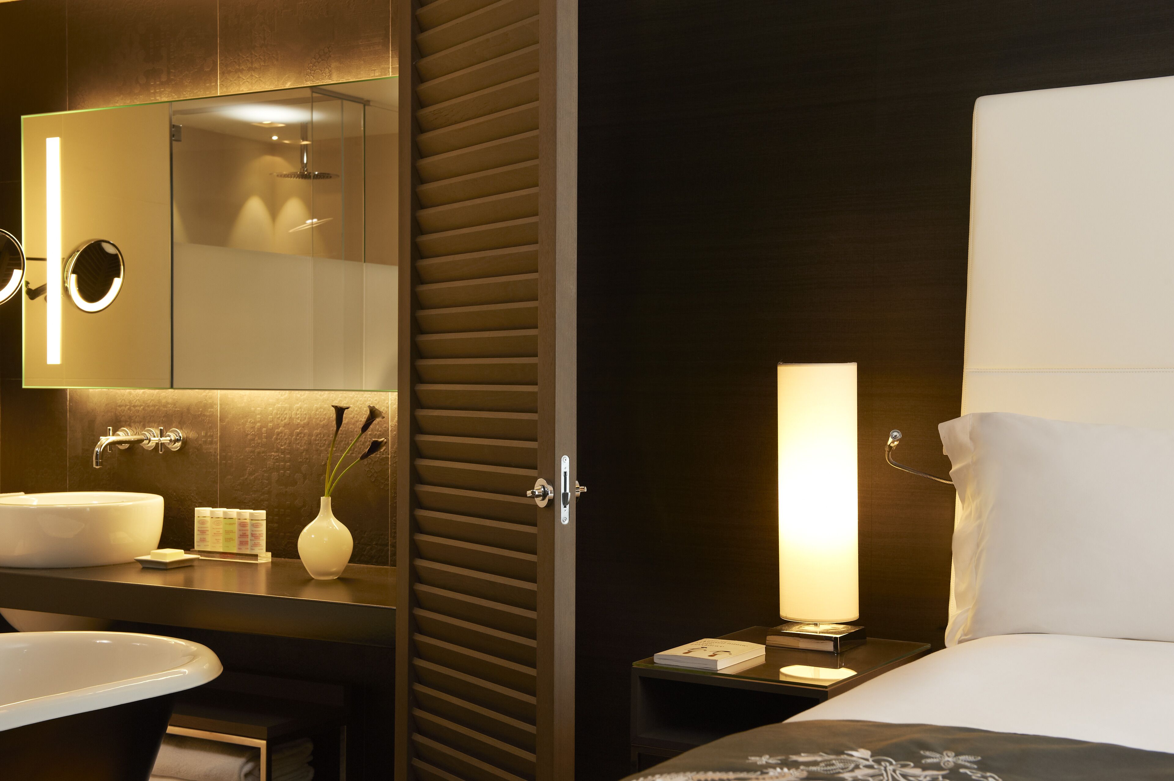 separate bathtub and shower, designer toiletries, hair dryer, bathrobes