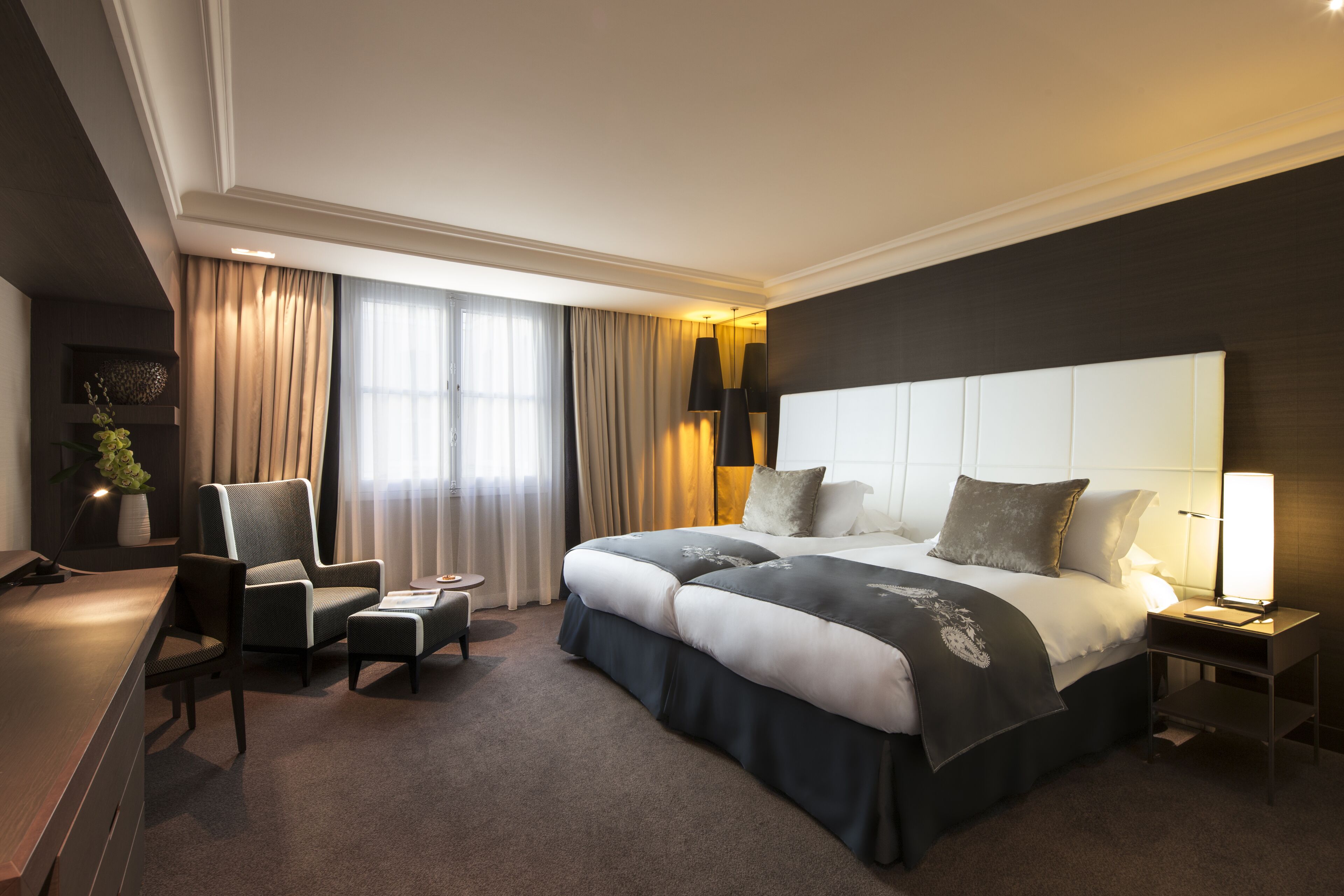 Premium bedding, down comforters, pillowtop beds, minibar