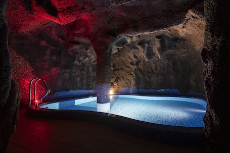 Indoor pool, outdoor pool, pool loungers. Odyssey ClubHotel Wellness & SPA