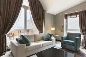 Suite, 1 King Bed, Smoking, Terrace | Minibar, in-room safe, soundproofing, iron/ironing board