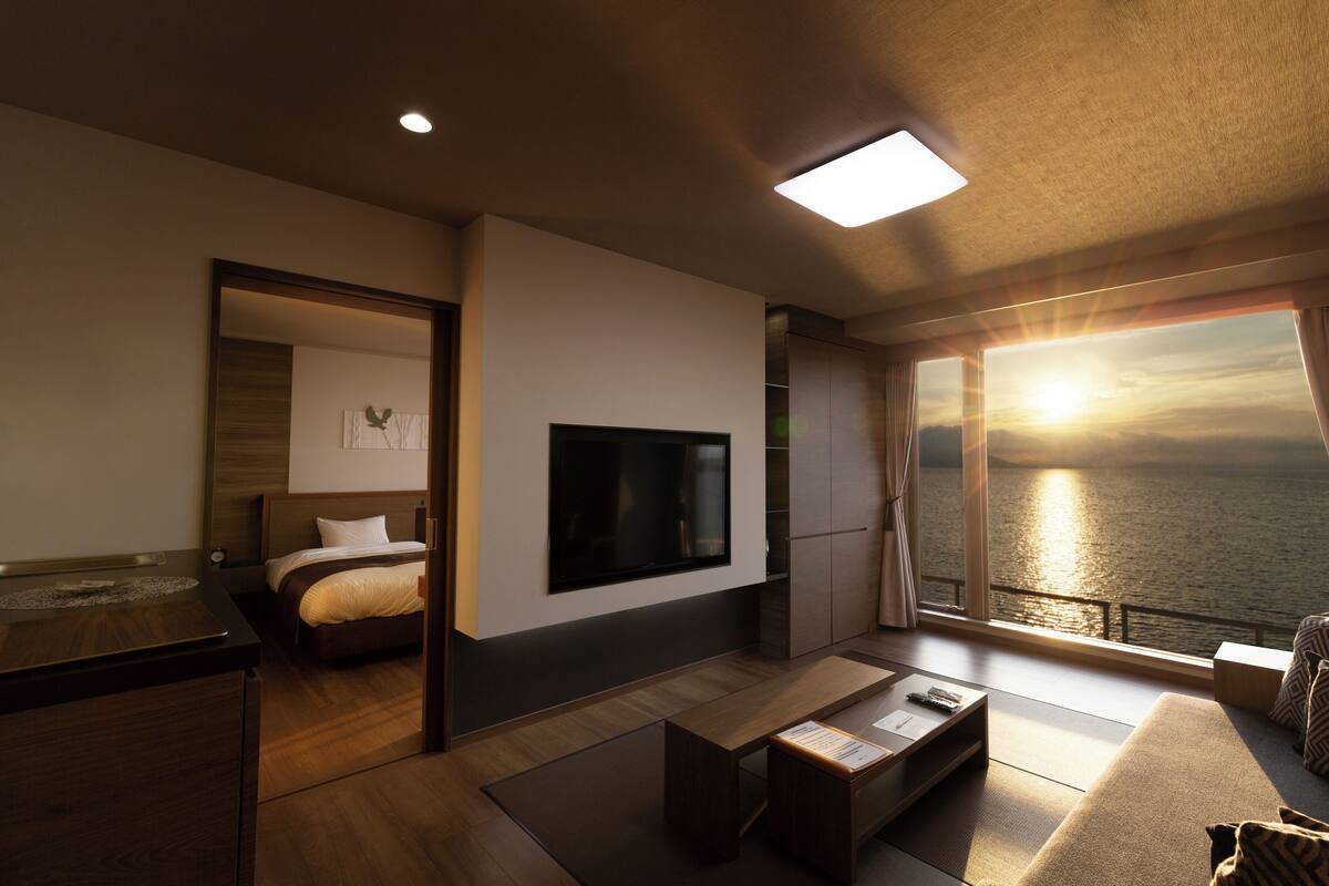 Deluxe Twin kamer, niet-roken, uitzicht op meer | Luxe beddengoed, een kluis op de kamer, gratis wifi, beddengoed