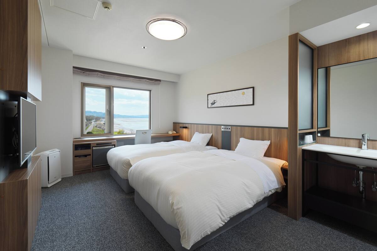 Habitació amb dos llits individuals econòmica, no fumadors (with Shower, Lakefront) | Roba de llit d'alta qualitat, caixa forta a l'habitació i wifi gratuïta