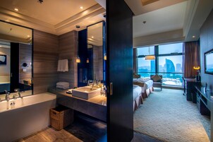 Premium bedding, down comforters, minibar, in-room safe