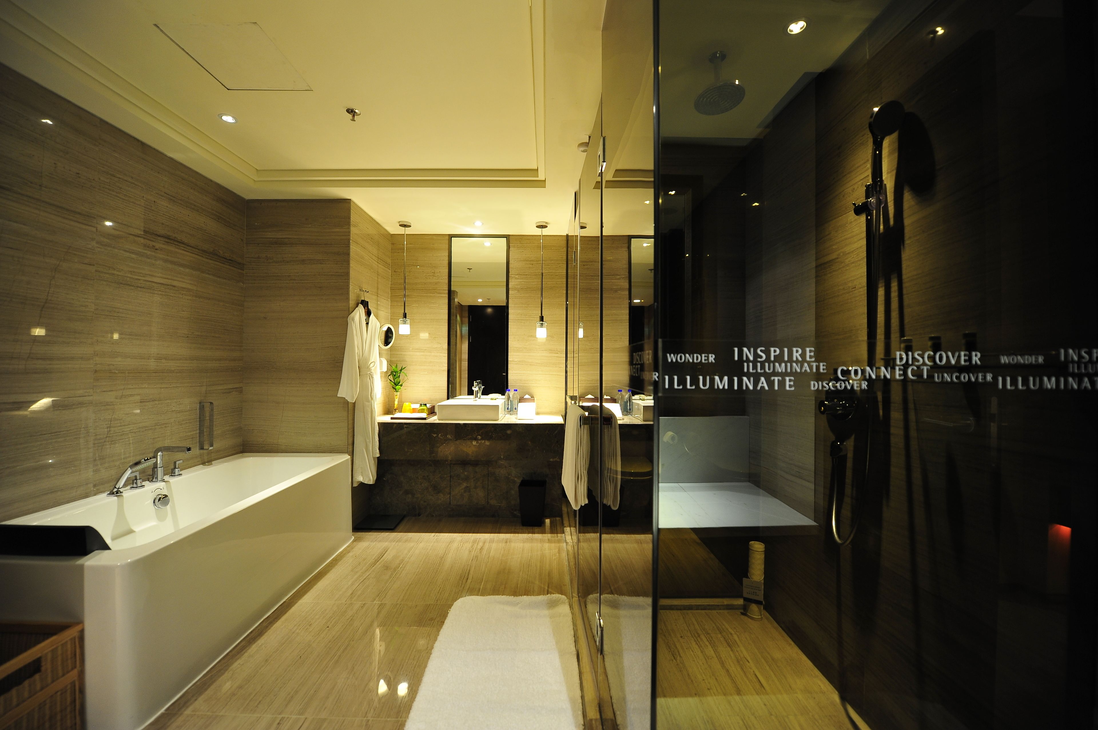 separate bathtub and shower, jetted bath, rainfall showerhead