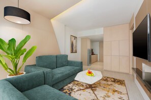 Suite, 1 King Bed with Sofa bed | Living area | 55-inch LCD TV with cable channels, TV, iPod dock - Hyatt Place Bangkok Sukhumvit 1 (Bangkok)