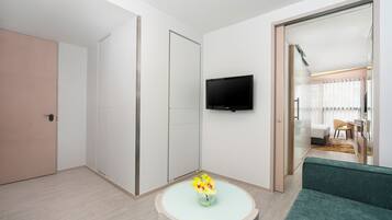 55-inch LCD TV with cable channels, TV, iPod dock