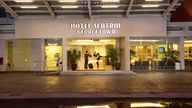 Hotel Central Georgetown with a modern entrance, reception desk, and seating area. - Sentral Georgetown (George Town)