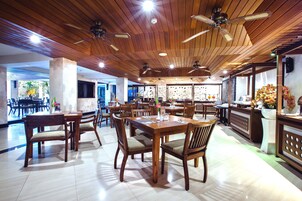 Breakfast, lunch served; local and international cuisine, garden views 