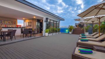Outdoor pool, pool umbrellas, pool loungers