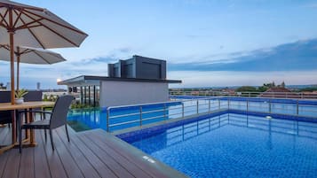 Outdoor pool, pool umbrellas, pool loungers