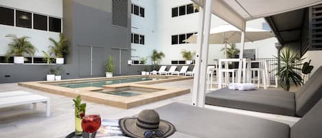 Outdoor pool, pool umbrellas, sun loungers