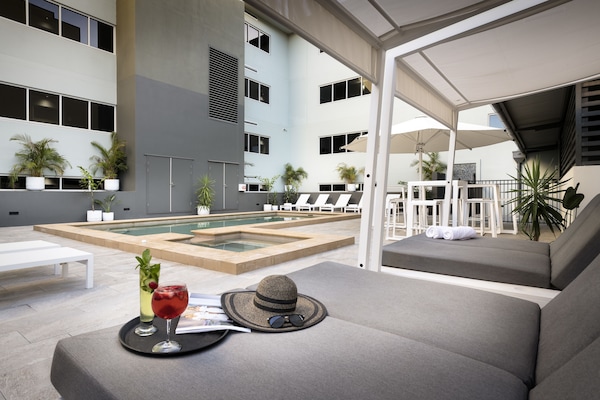 Outdoor pool, pool umbrellas, pool loungers