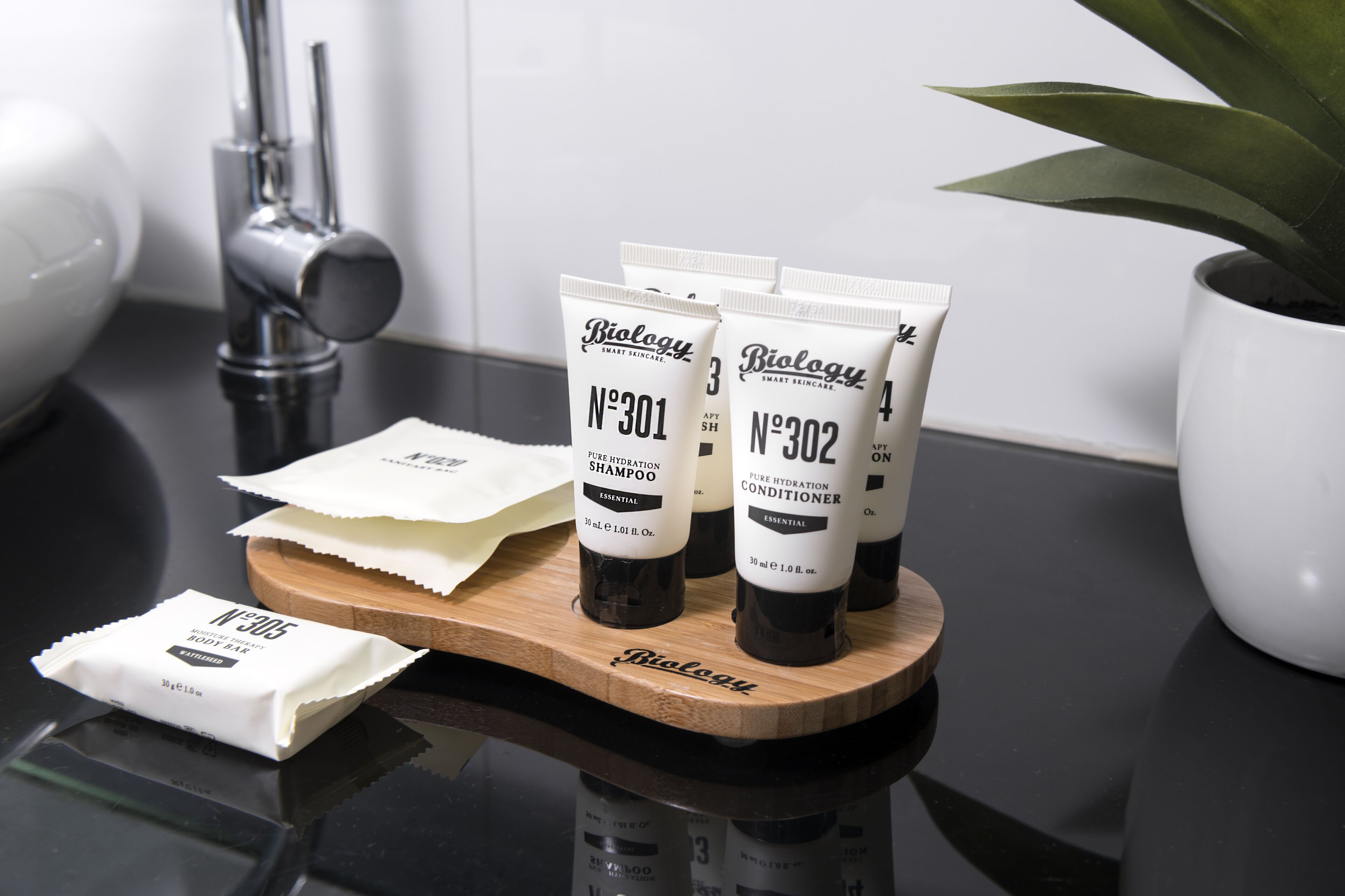 shower, designer toiletries, hair dryer, towels