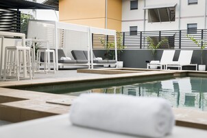 Outdoor pool, pool umbrellas, sun loungers