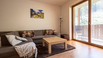 Superior Apartment | Living area | LCD TV, foosball, heated floors