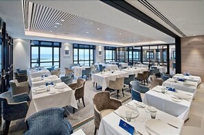 Breakfast, lunch, dinner served; beach views
