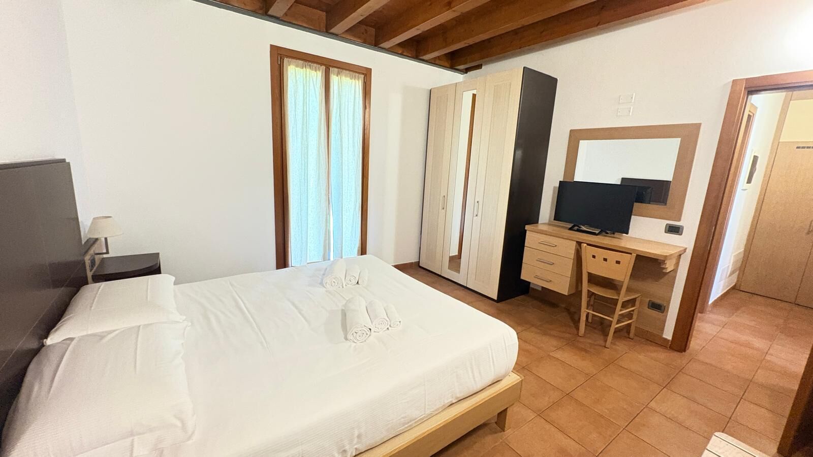 Camera Quintupla Dependance | Ropa de cama de alta calidad y minibar 