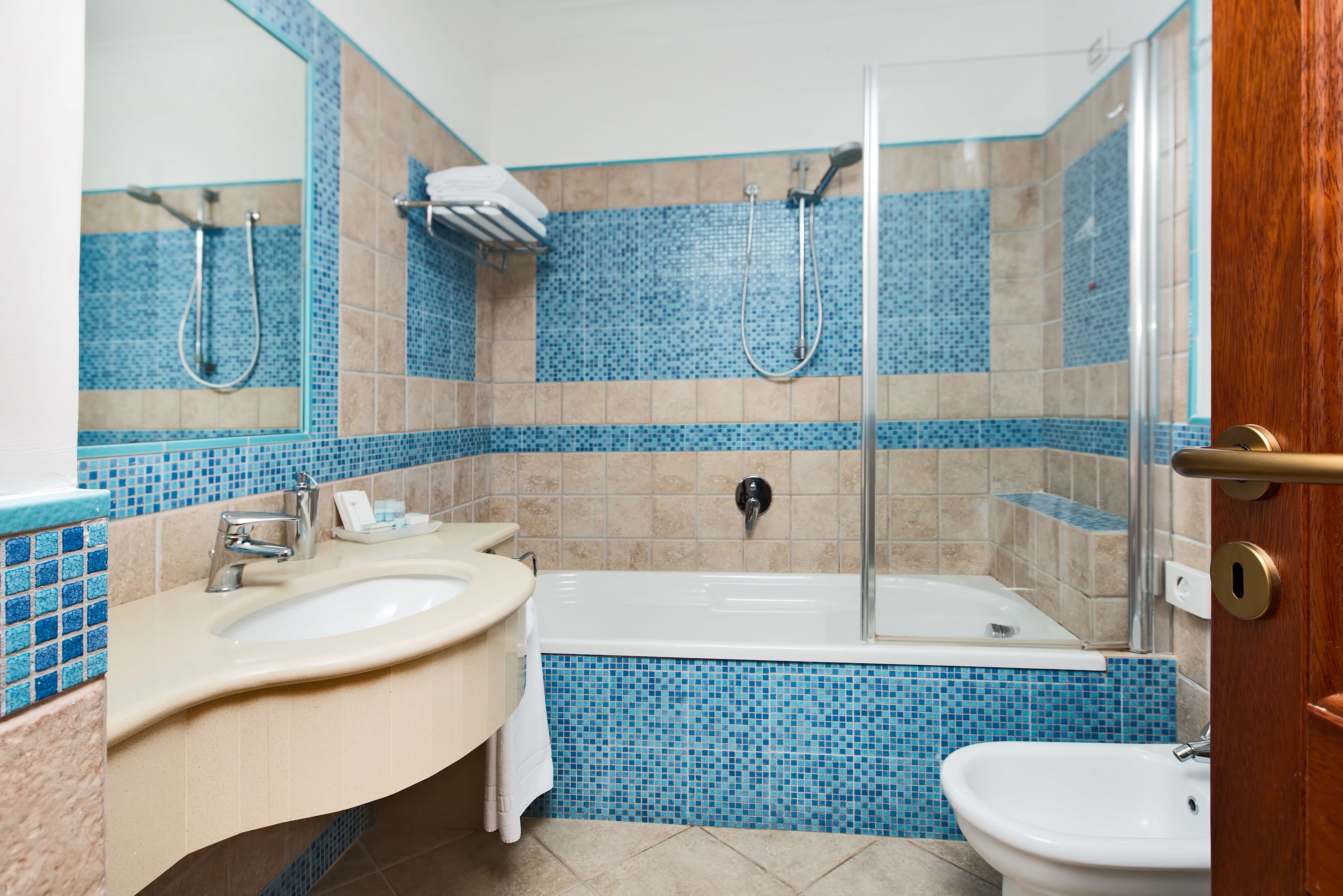 deep-soaking bathtub, rainfall showerhead, free toiletries, hair dryer