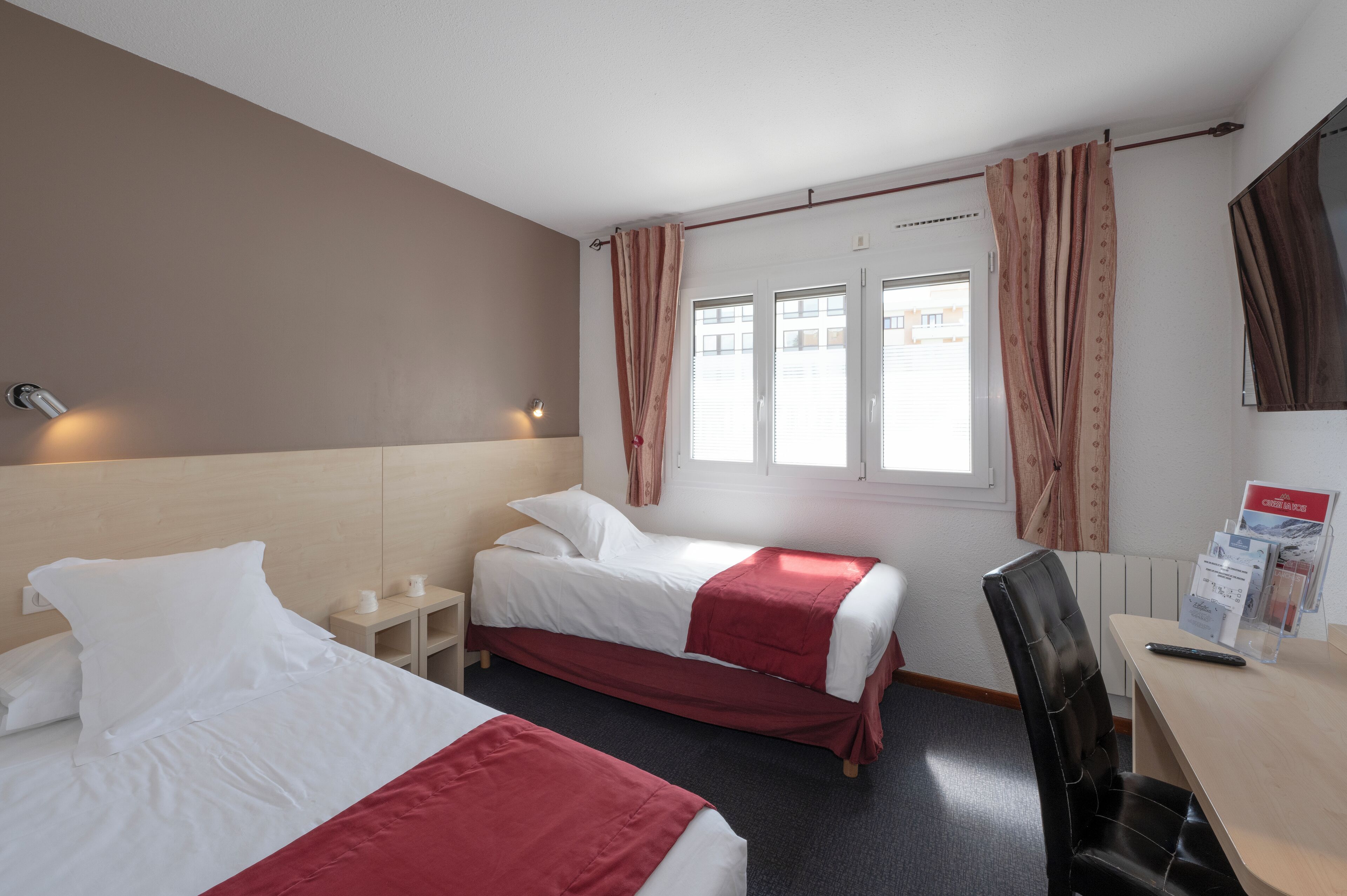 comfort twin room | premium bedding, individually decorated, desk, laptop workspace