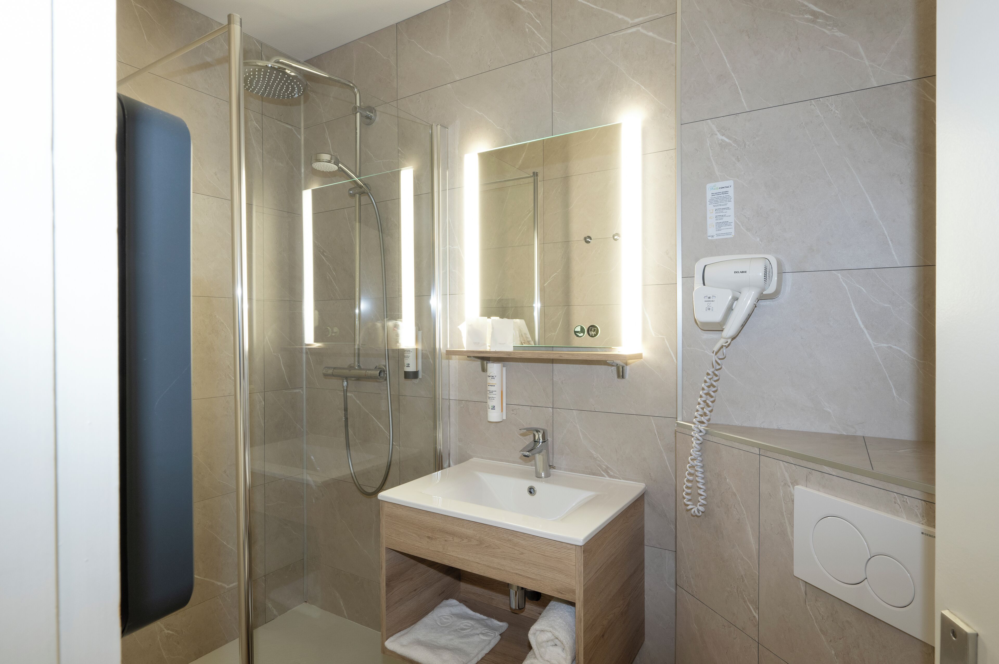 shower, free toiletries, hair dryer, towels