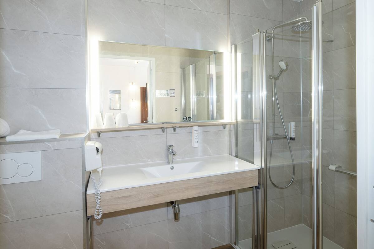 comfort triple room | bathroom | shower, free toiletries, hair dryer, towels
