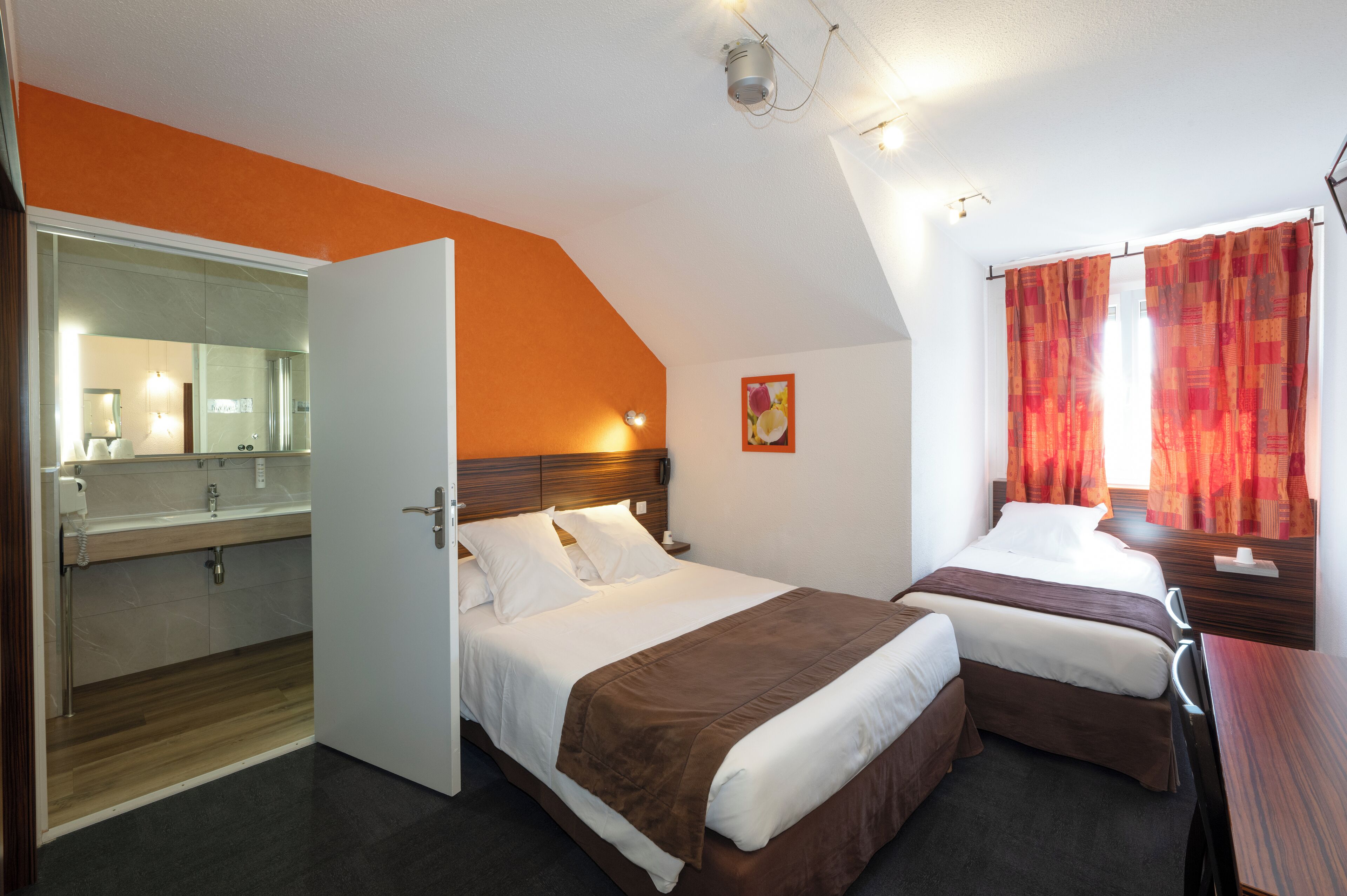 comfort triple room | premium bedding, individually decorated, desk, laptop workspace