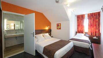 Comfort Triple Room | Premium bedding, individually decorated, desk, laptop workspace