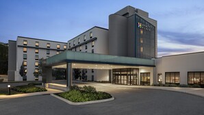A modern hotel with a glass entrance, multiple floors, and a prominent 'Hyatt Place' sign. - Hyatt Place Boston/Braintree (Braintree)