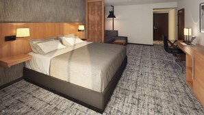 A modern hotel room with a large bed, a desk, a chair, and a small seating area. - Hyatt Place Boston/Braintree (Braintree)