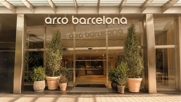 A modern building entrance with the name 'arco barcelona' displayed prominently. - Arco Barcelona Hotel (Barcelona)