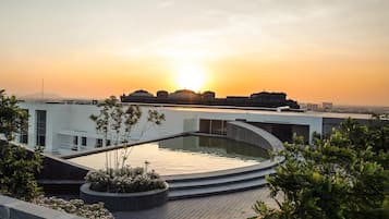 Outdoor pool, open 6:00 AM to 9:00 PM, pool umbrellas, sun loungers