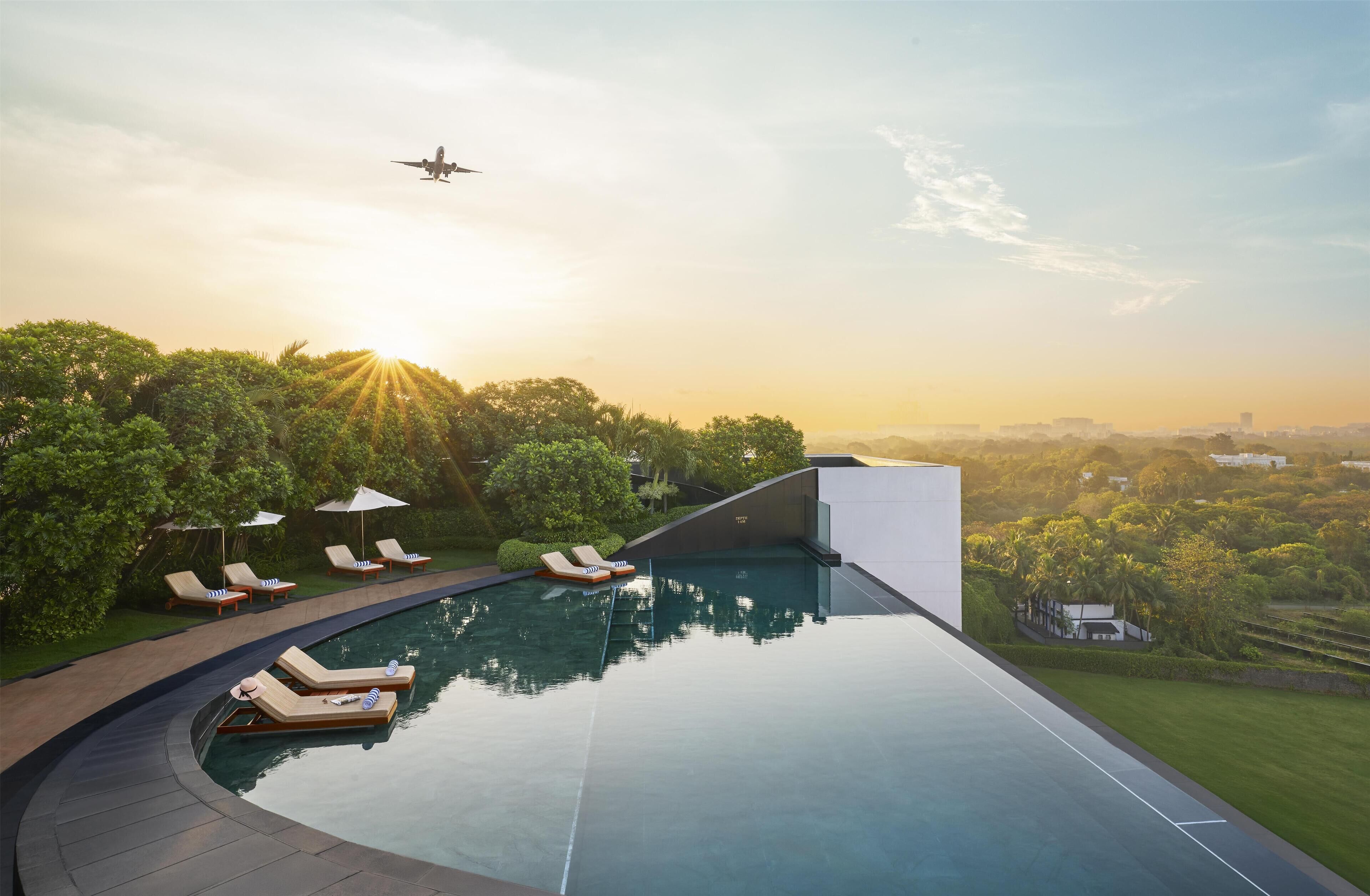 Outdoor pool, open 6:00 AM to 9:00 PM, pool umbrellas, sun loungers