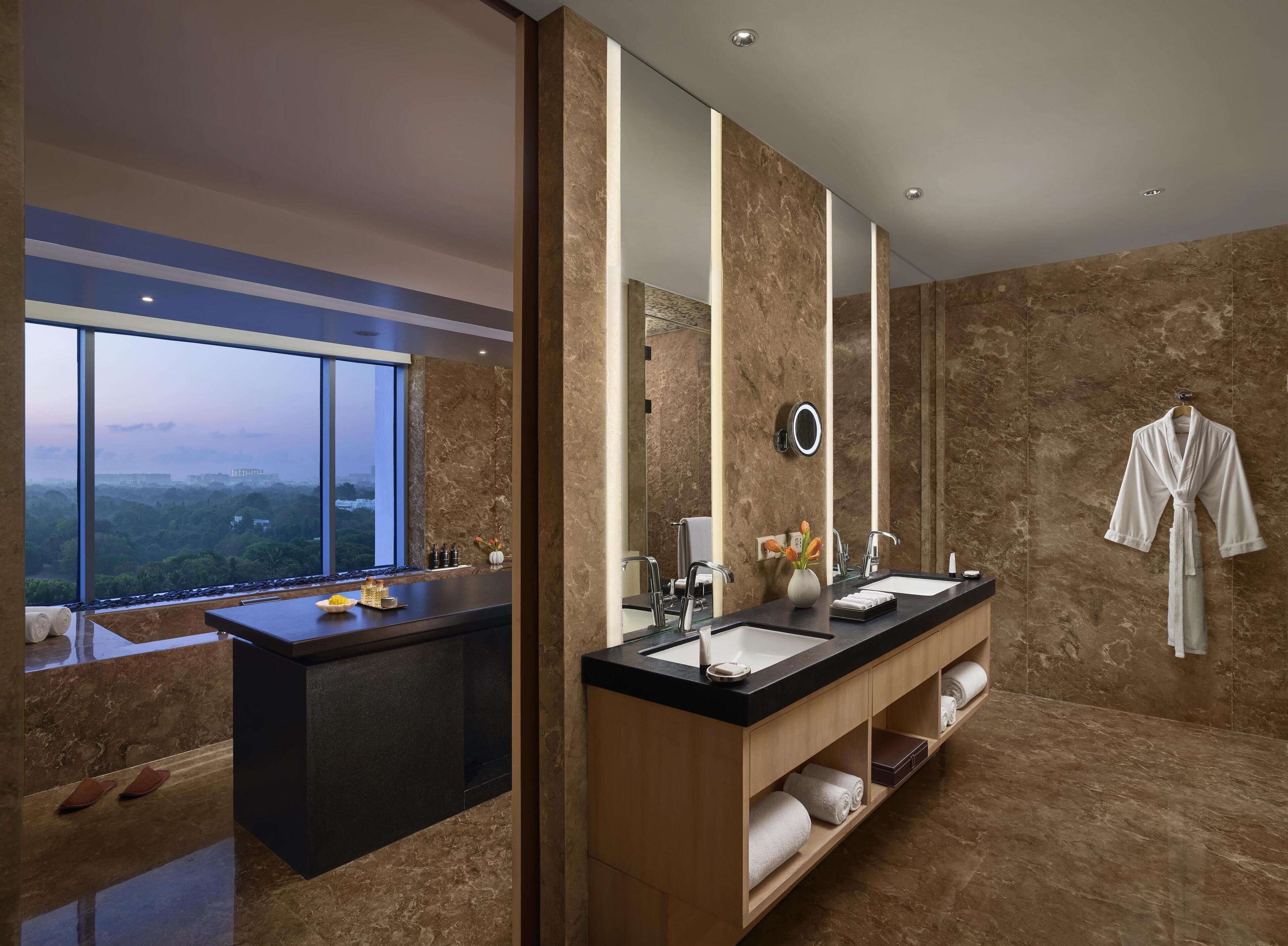 combined shower/bathtub, deep-soaking bathtub, rainfall showerhead