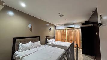Premium bedding, Tempur-Pedic beds, desk, iron/ironing board