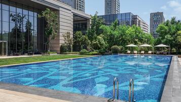 Indoor pool, seasonal outdoor pool, pool umbrellas, sun loungers