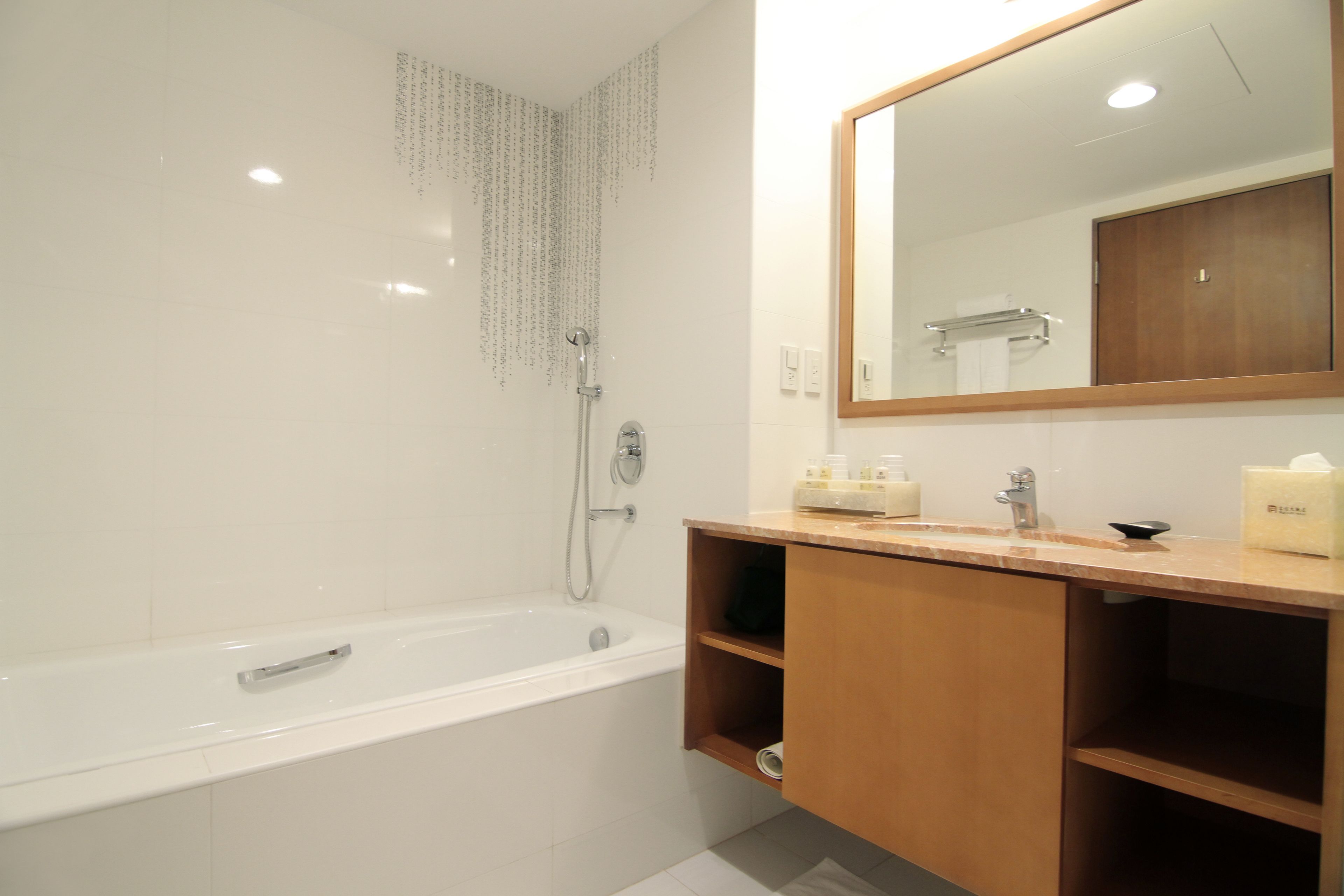 deluxe room b | bathroom | hair dryer, towels