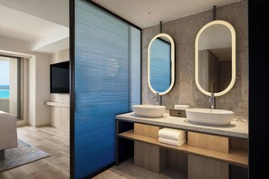 Suite | Bathroom | Separate tub and shower, free toiletries, hair dryer, slippers - Courtyard by Marriott Okinawa Resort (Nago)