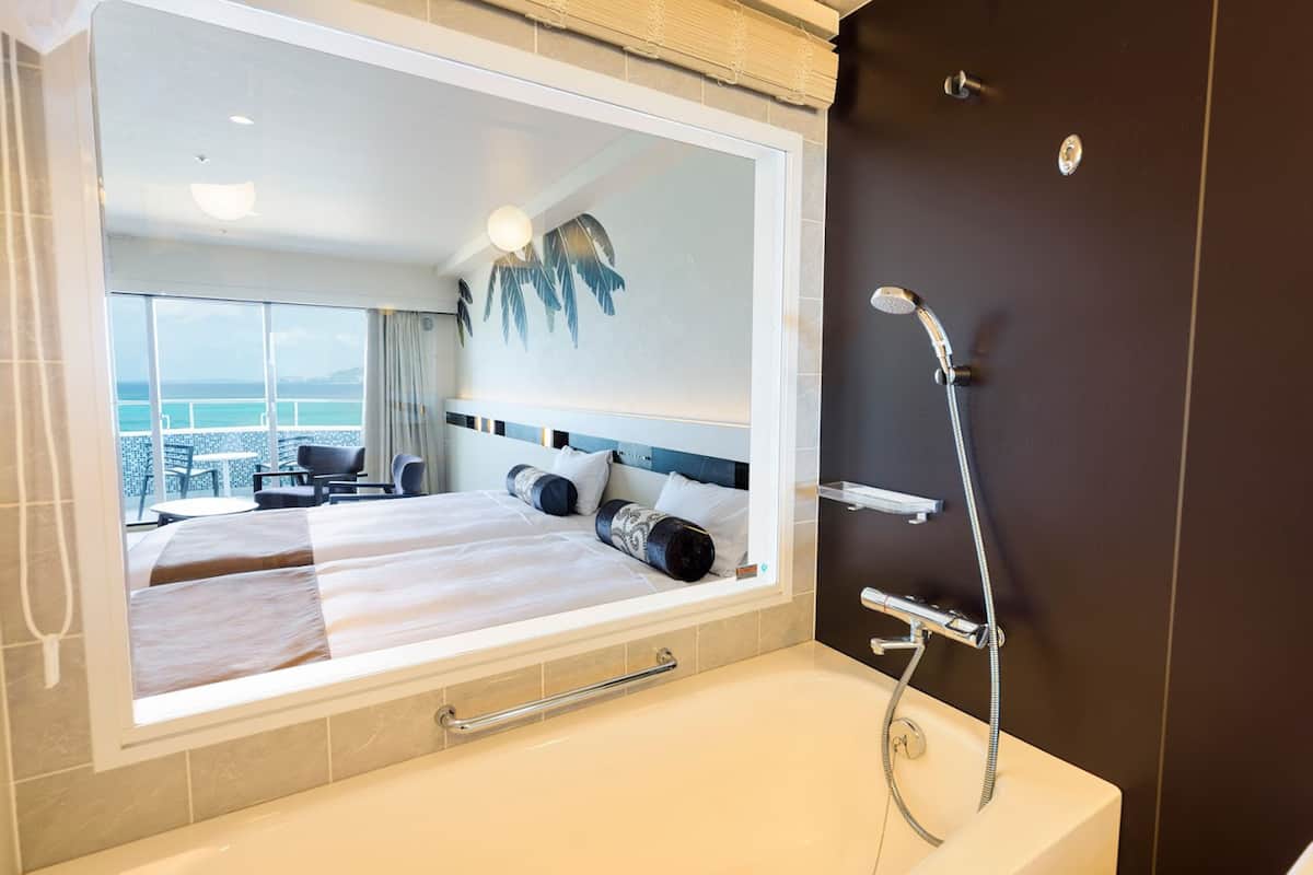 separate bathtub and shower, free toiletries, hair dryer, slippers