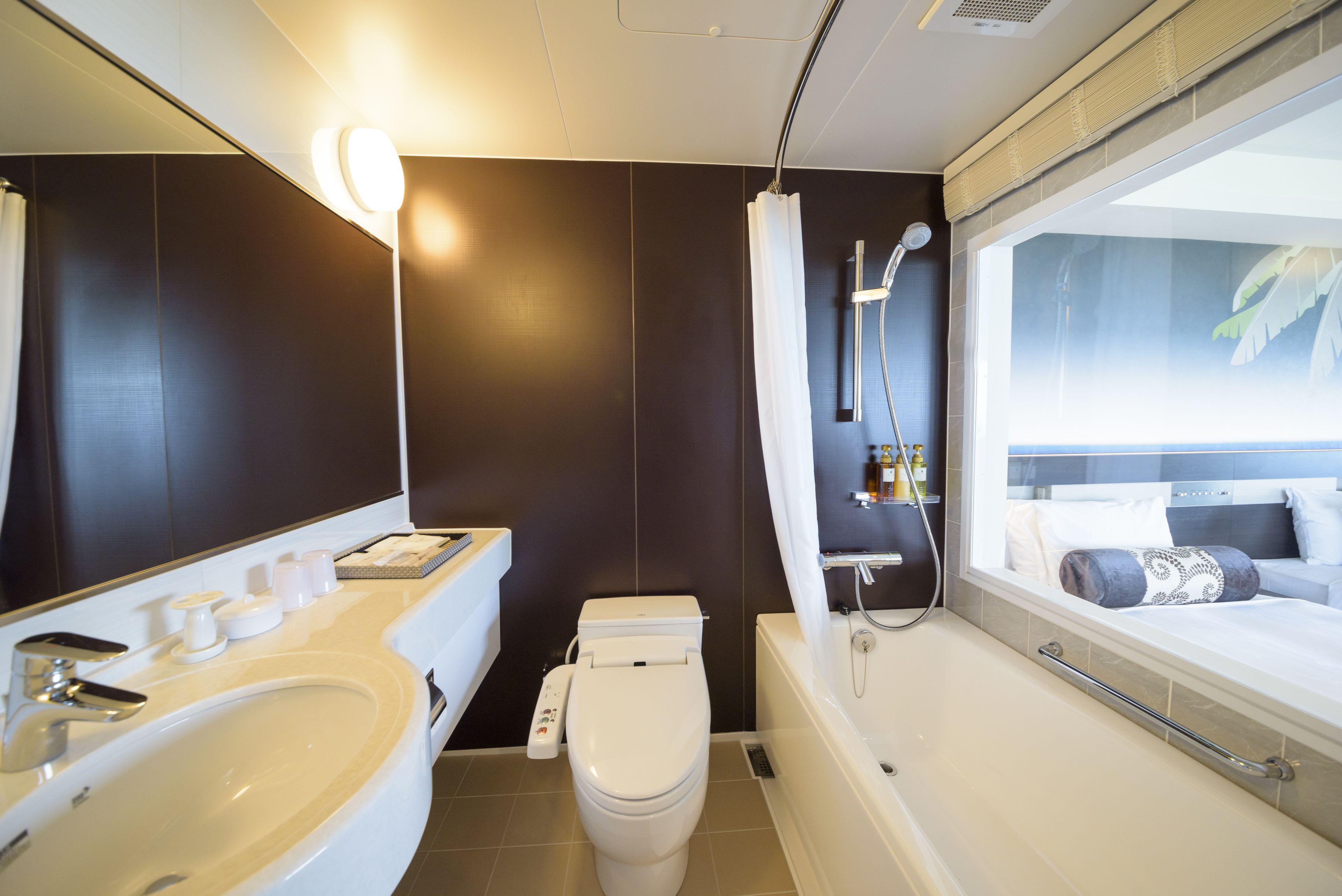 separate bathtub and shower, free toiletries, hair dryer, slippers