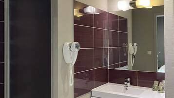 Shower, free toiletries, hair dryer, towels