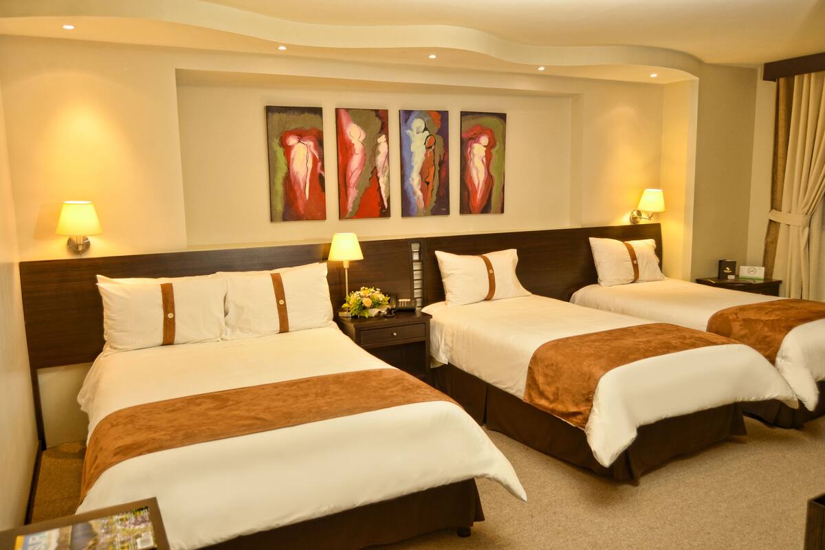 Triple Room | Premium bedding, in-room safe, desk, blackout drapes
