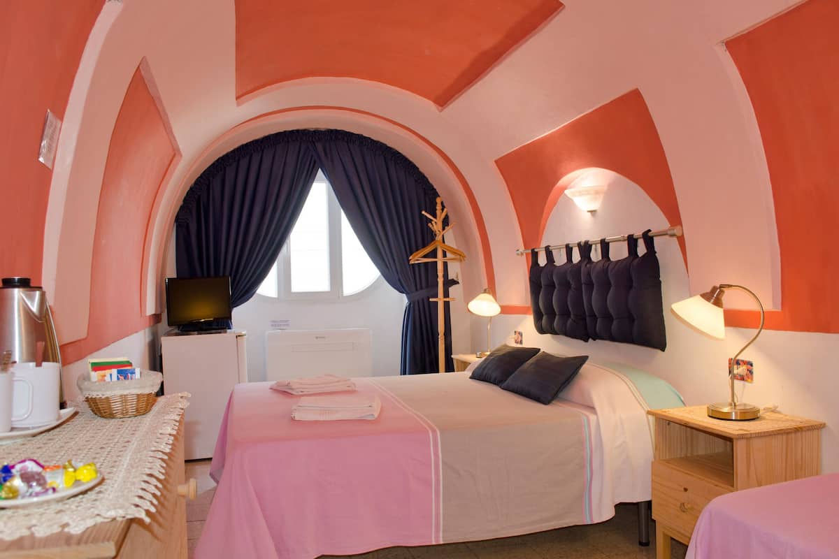 Economy Double Room (External Private Bathroom) | Minibar, in-room safe, desk, blackout drapes