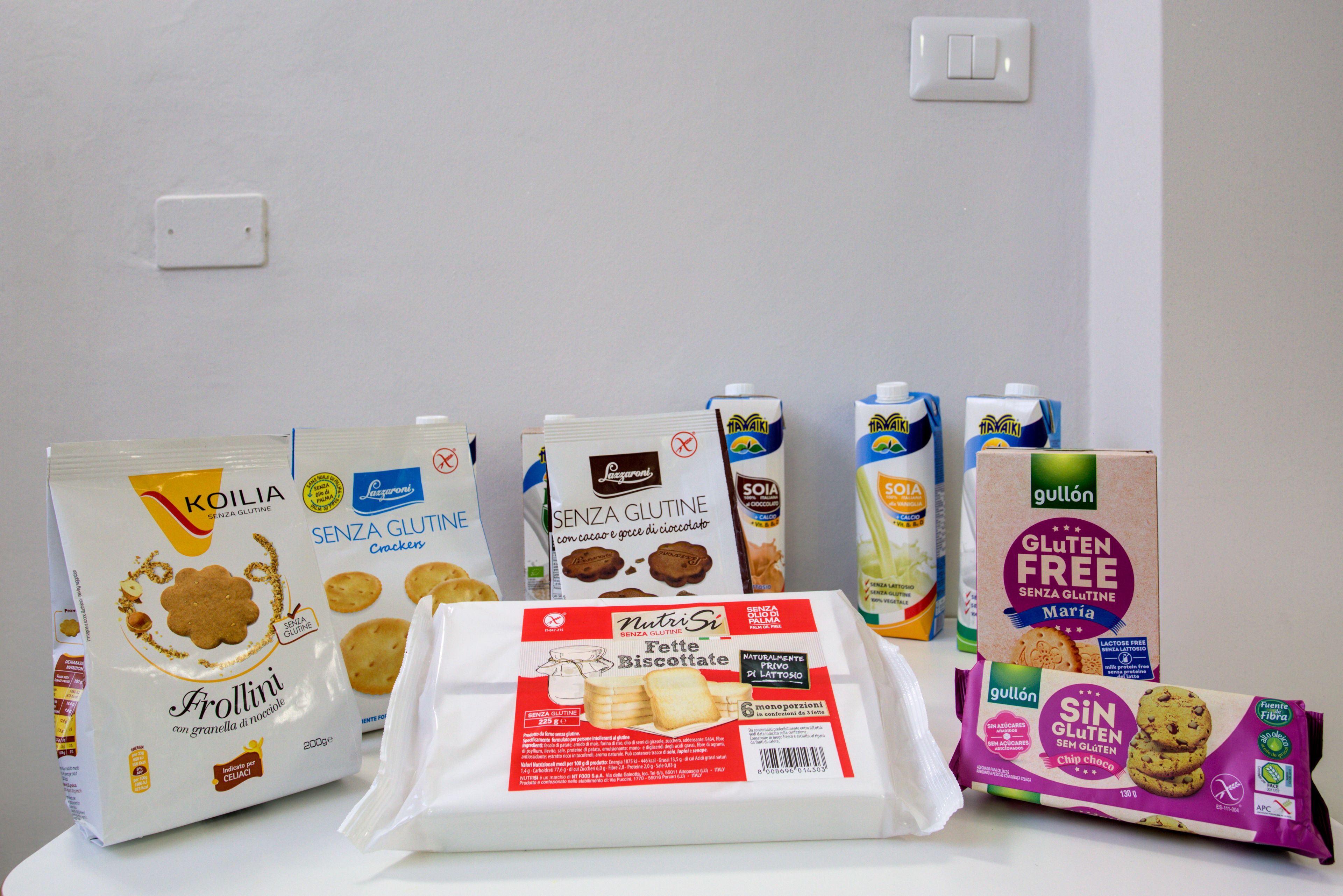 Various gluten-free food products including crackers, biscuits, and cookies.