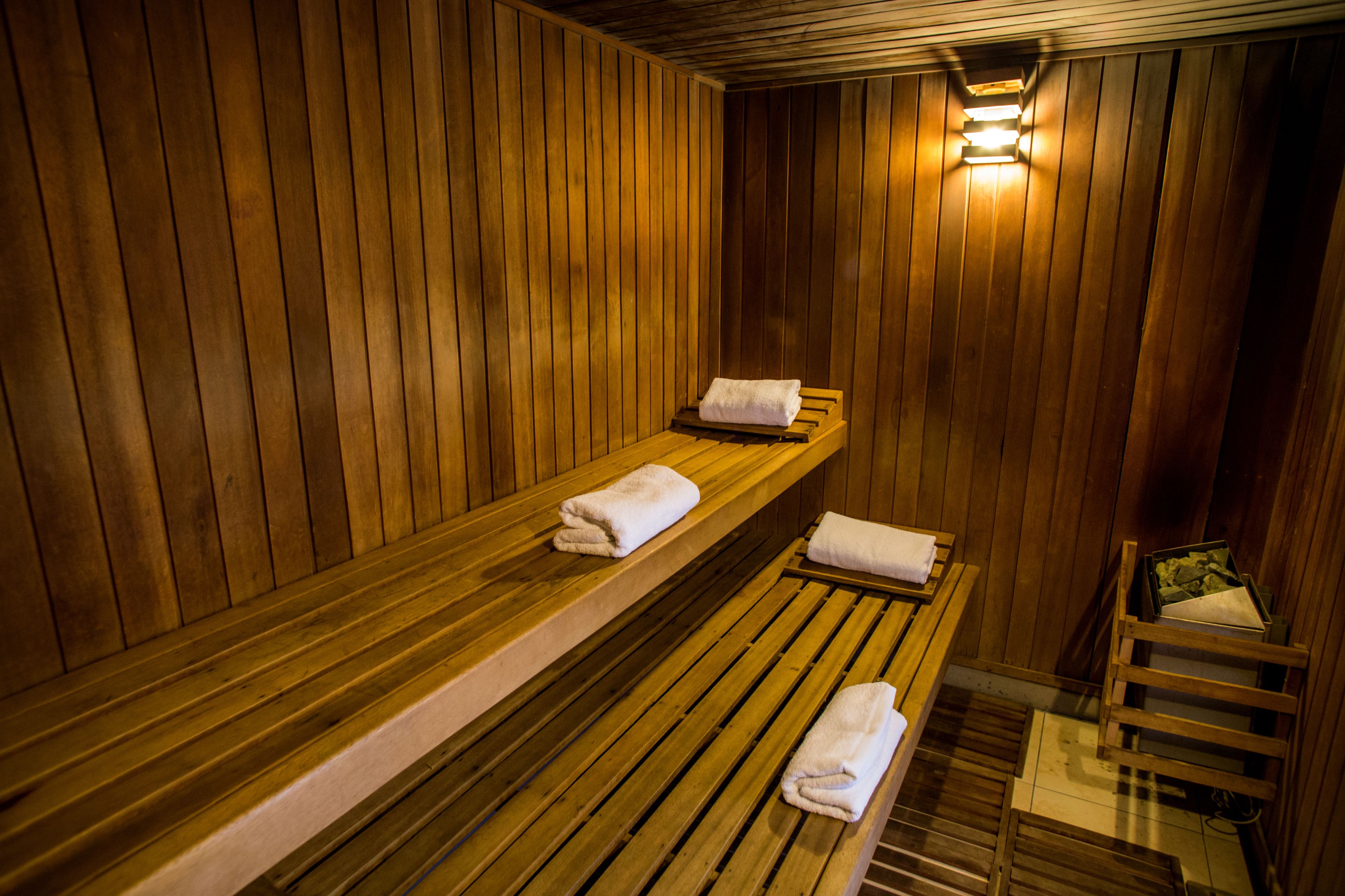 A wooden sauna with benches and benches.