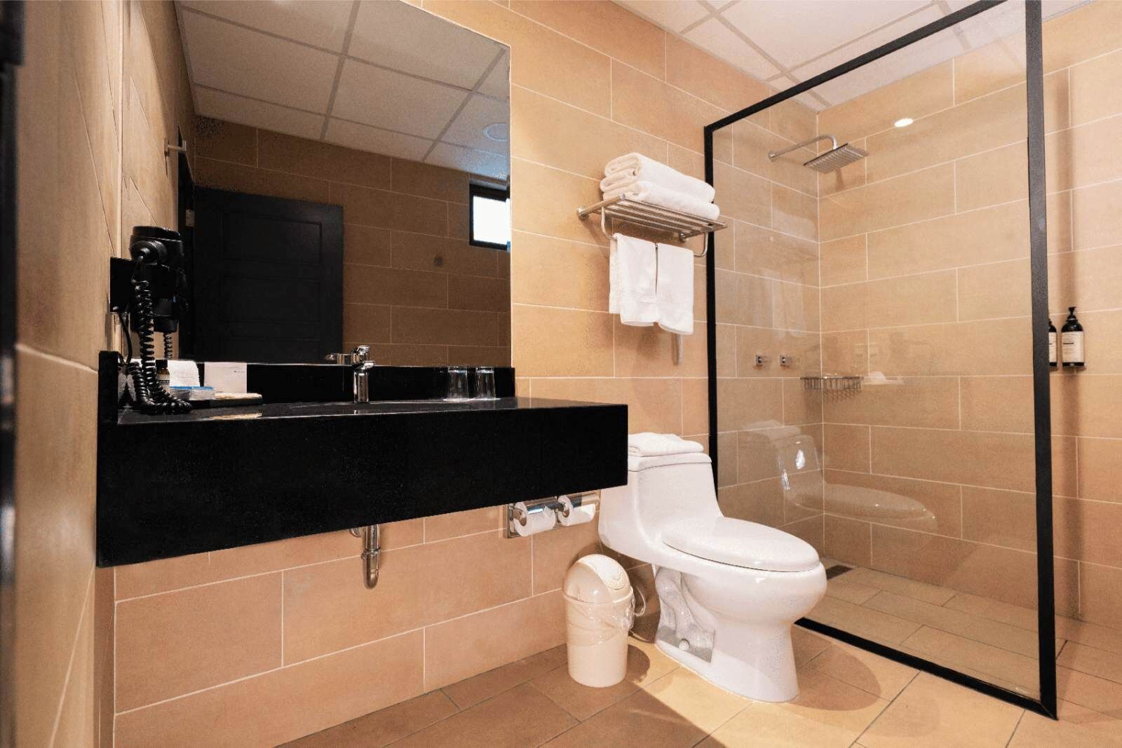executive suite, 1 king bed | bathroom | combined shower/bathtub, deep-soaking bathtub, free toiletries, towels